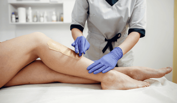 Professional sugaring hair removal for legs at Sugar Fairy.