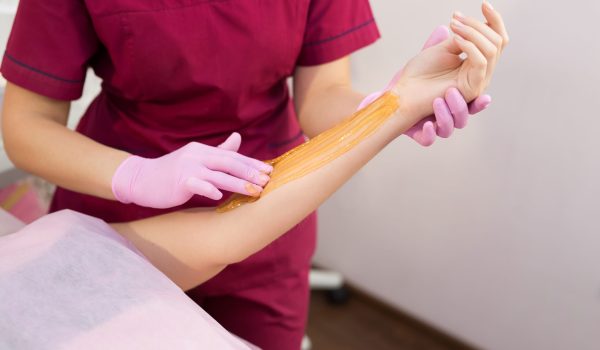 Professional full-arm sugaring hair removal at Sugar Fairy.